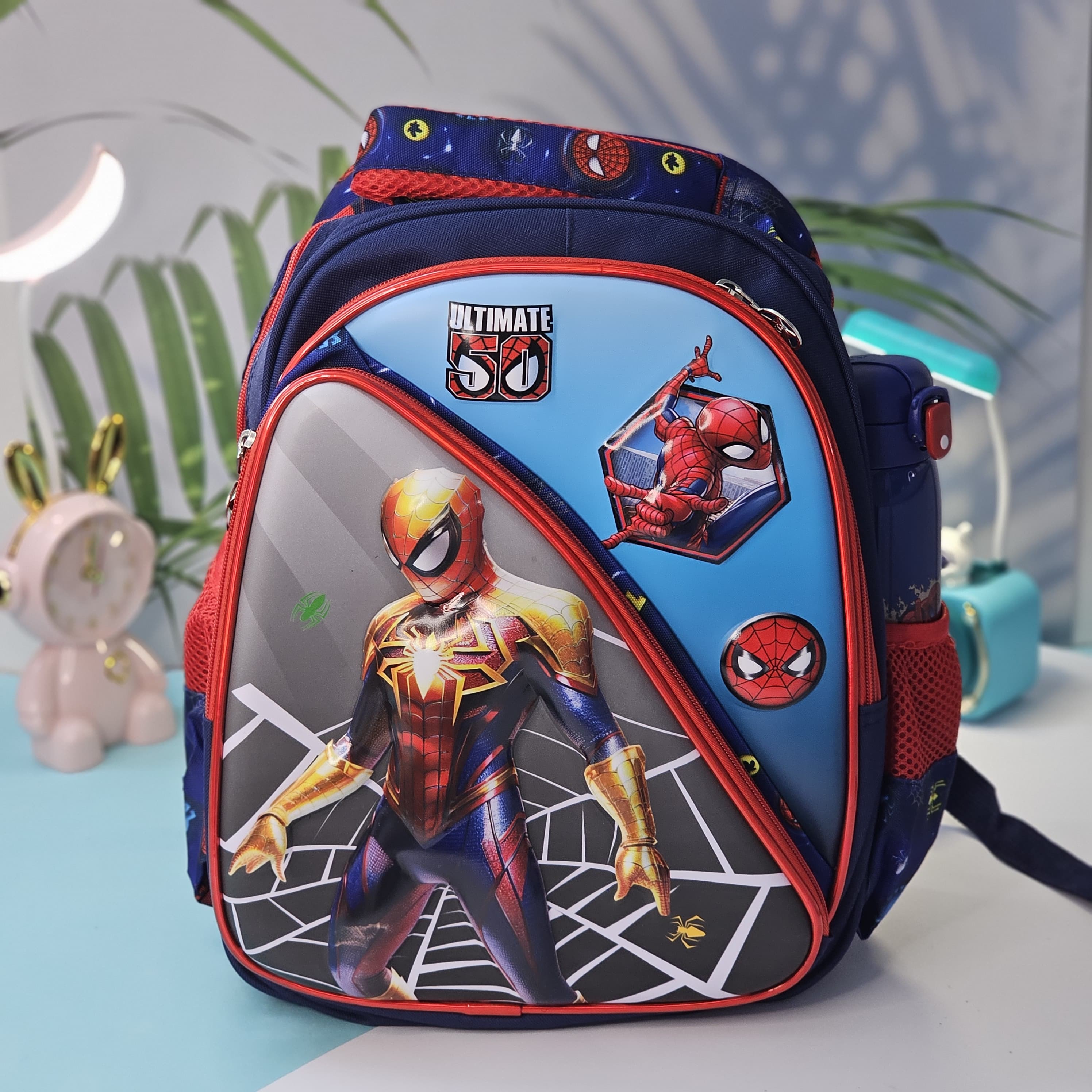 Front view of an Usmile Toys superhero backpack for kids, displaying detailed illustrations of Iron Man and other Avengers characters, suitable for school or travel." www.usmile.toys
